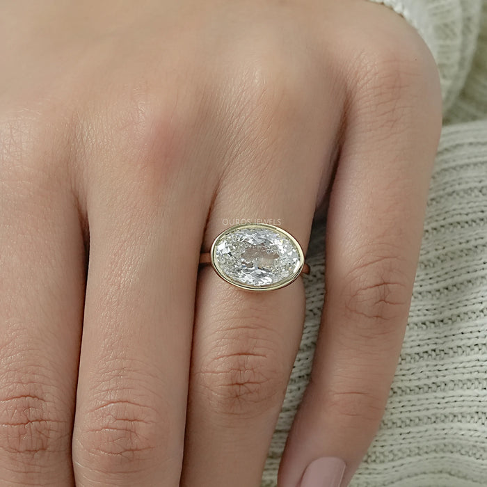 East West Portuguese Oval Bezel Set Engagement Ring