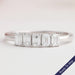 front view of emerald-cut lab diamond five-stone wedding ring with white gold band
