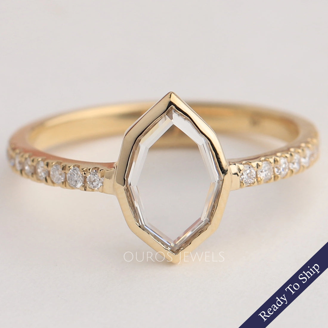 Moval Cut Solitaire Accent Diamond Ring