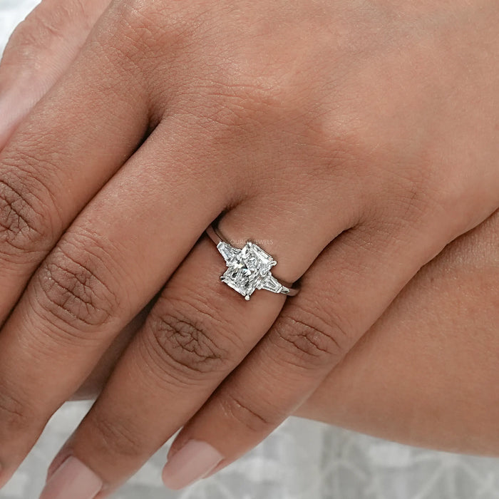 Brilliant Radiant Cut And Tapered Baguette Three stone ring