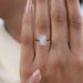 2.50 carat radiant cut diamond hidden halo wedding ring on model's hand