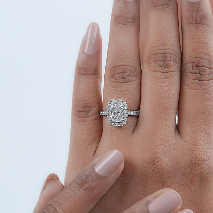 radiant cut lab diamond halo engagement ring in finger