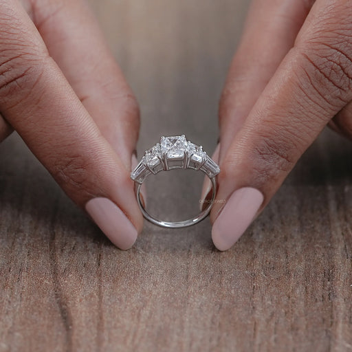 close view of radiant cut diamond five stone engagement ring in white gold band