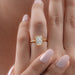 radiant cut lab diamond bezel set engagement ring in finger