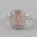 top view of fancy pink radiant cut diamond halo engagement ring