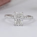 front view of radiant-cut lab diamond solitaire accent engagement ring on grey fabric