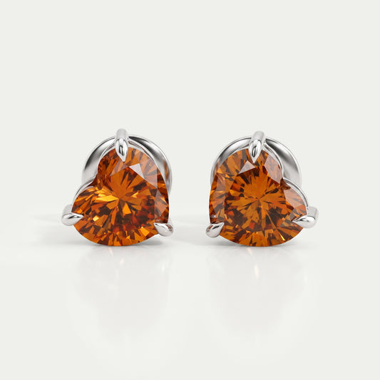 Boucles d'oreilles à tige avec solitaire en diamant et cœur rouge
