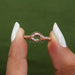 top view of east-west rose-cut oval lab diamond solitaire engagement ring