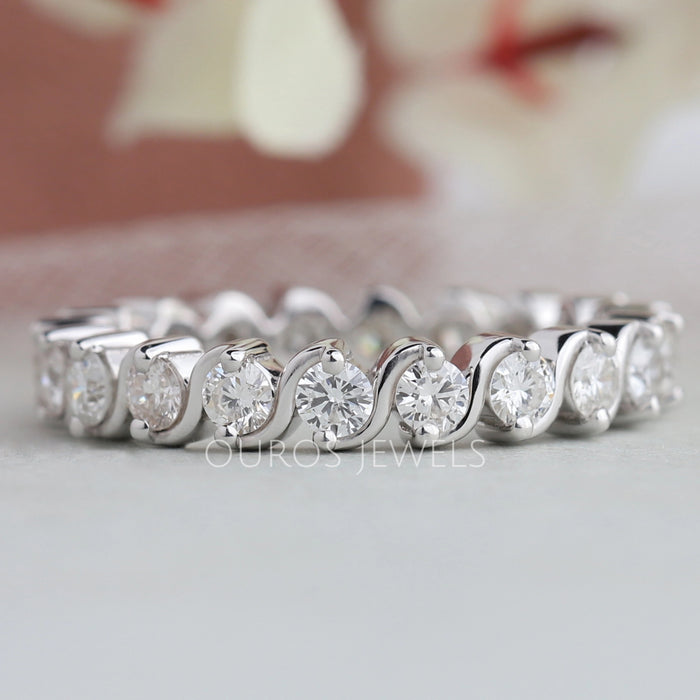front view of round cut lab grown diamond eternity wedding band white gold