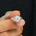 close view of round cut lab diamond white gold men's engagement ring