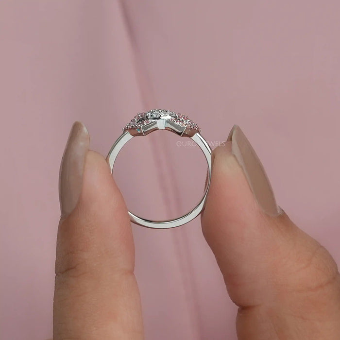 close view of round-cut lab-grown diamond classic wear bow ring pink