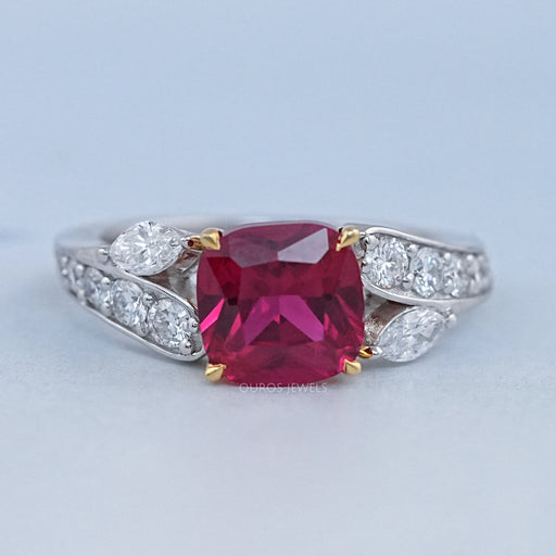 front view of pink ruby cushion cut gemstone solitaire split-shank wedding ring