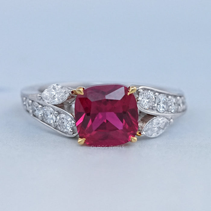 front view of pink ruby cushion cut gemstone solitaire split-shank wedding ring