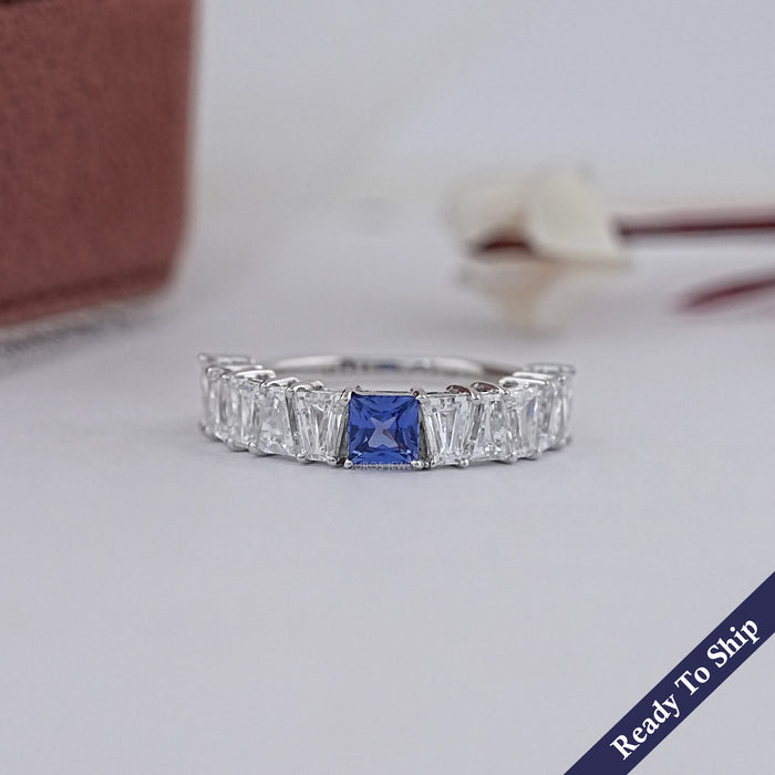 Sapphire Princess And Tapered Baguette Cut Half Eternity Band