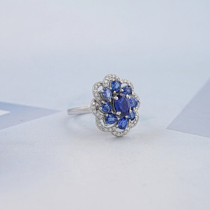 Blue Sapphire and Diamond Floral Halo Ring