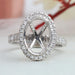 front view of oval semi-mount round diamond halo engagement ring