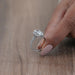 radiant cut lab diamond halo engagement ring's close side angle view 