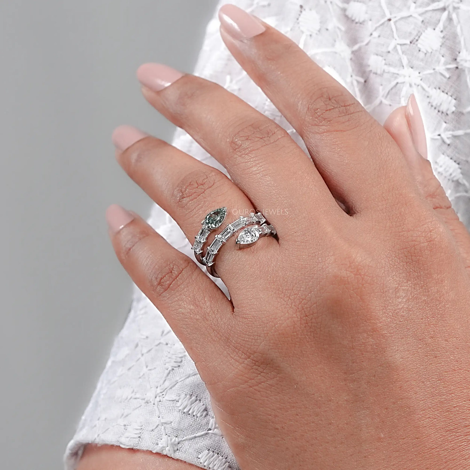 Spiral Shape Baguette And Pear Diamond Ring