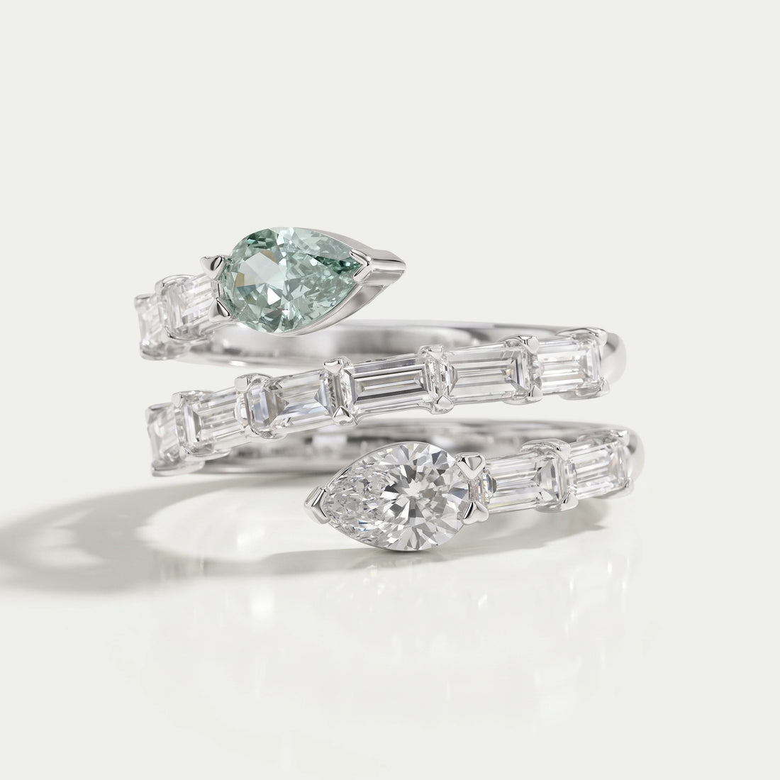 Spiral Shape Baguette And Pear Diamond Ring