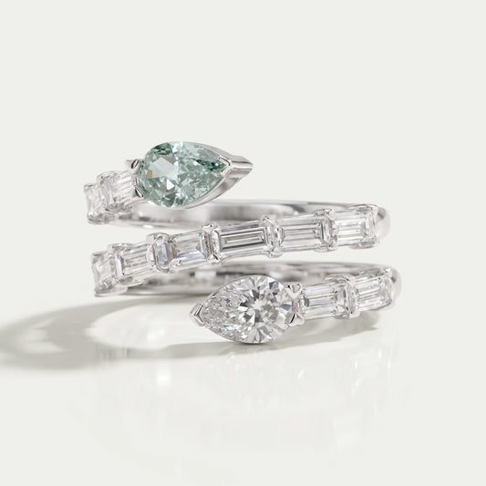 Spiral Shape Baguette And Pear Diamond Ring