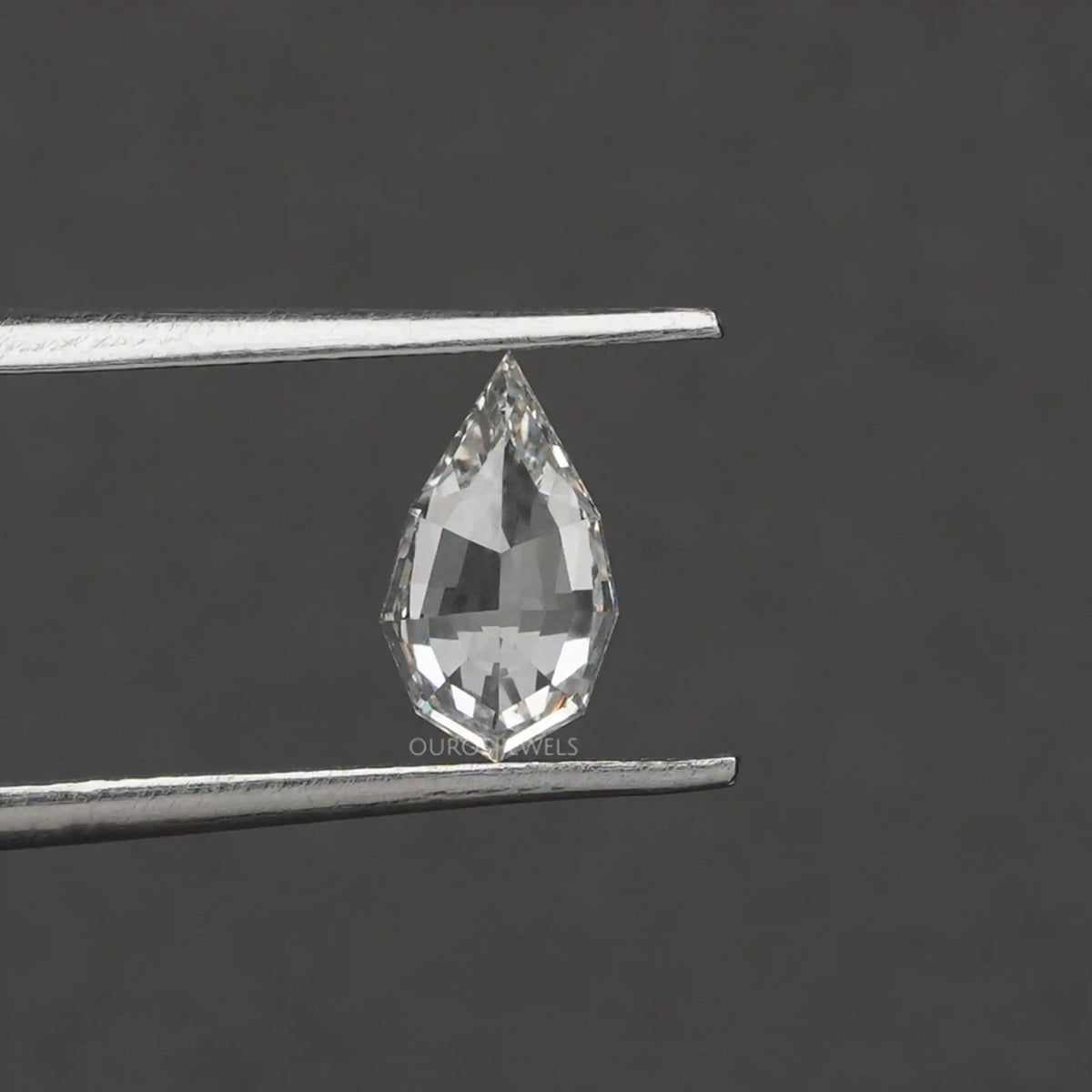 4.15 TCW Step Cut Pear And Kite Diamond Loose Pair