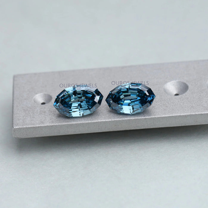 step cut blue oval lab made diamonds pair on matte material