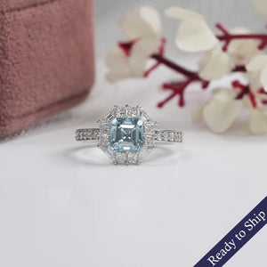 Bague fantaisie avec diamant de laboratoire taille Asscher bleu halo et accent