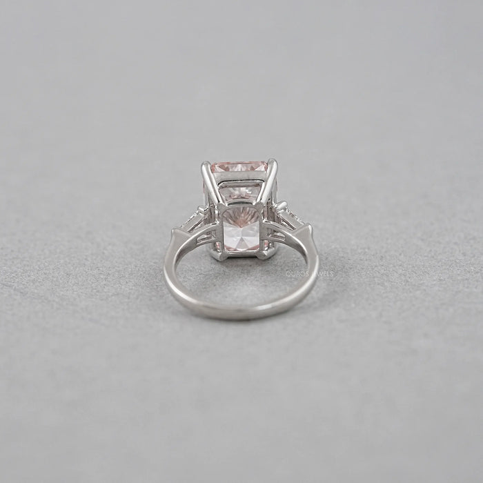 back view of pink radiant-cut lab diamond three-stone colored engagement ring