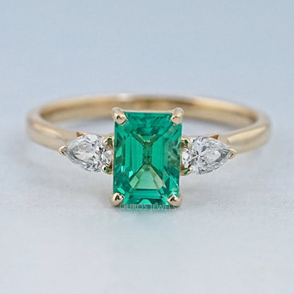 Emerald Gemstone And Pear Diamond Trio Engagement Ring Rings