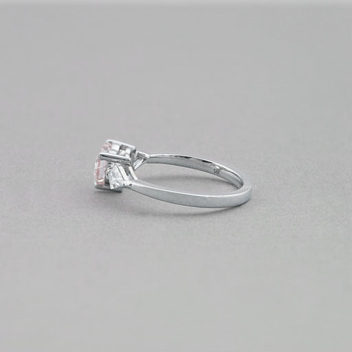 side view of fancy pink heart cut lab diamond 3 stone engagement ring