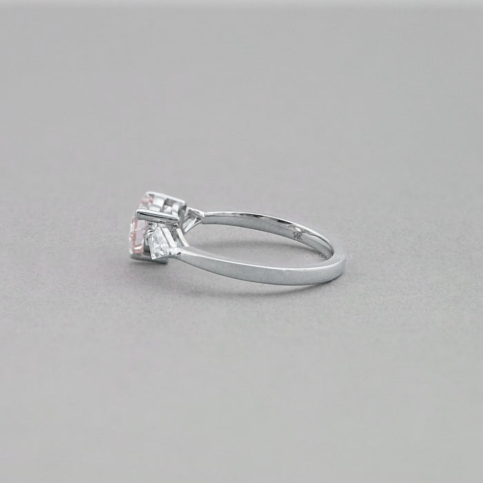 side view of fancy pink heart cut lab diamond 3 stone engagement ring