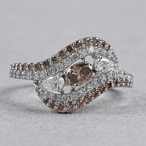 front view of brown oval lab diamond three-stone  bypass colored engagement ring