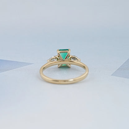 Emerald Gemstone And Pear Diamond Trio Engagement Ring Rings