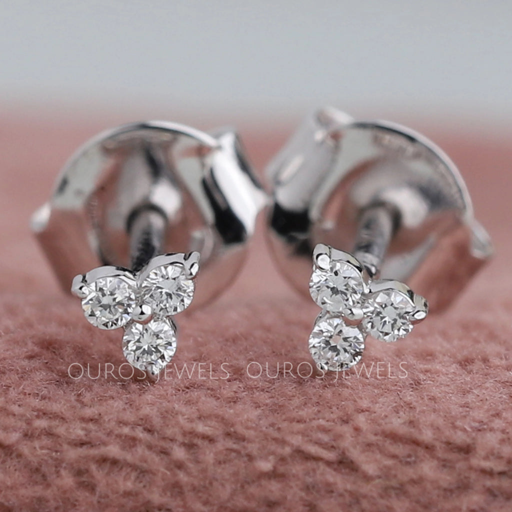 front view of trinity tiny round diamond push back stud earrings white gold 