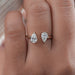 front view of two stone pear-cut lab diamond toi et moi open cuff wedding ring