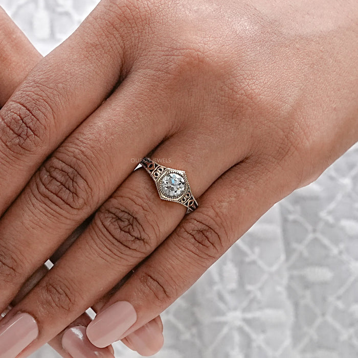 vintage old european round cut art deco engagement ring in finger