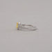 side view of yellow oval cut diamond split shank halo engagement ring
