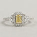 front view of yellow radiant cut diamond three stone halo engagement ring