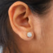 diamond halo stud earrings