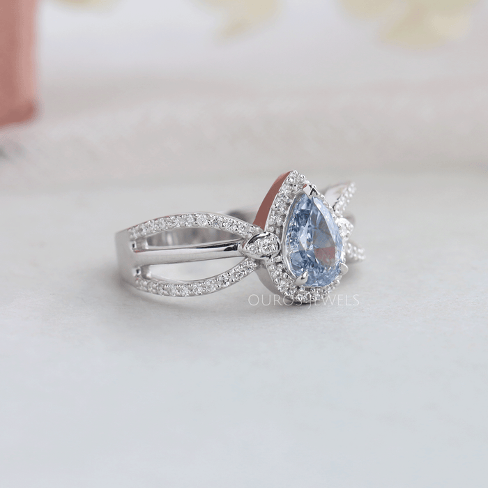 [Side Look Of 1 Carat Fancy Blue Lab Diamond With Round Cut Diamond Halo Engagement Ring]-[Ouros Jewels]