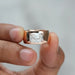 close view of east west criss cut lab diamond men's engagement ring in rose gold
