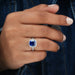 blue cushion cut lab diamond halo engagement ring in finger