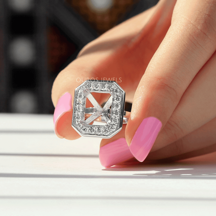 top view of emerald-cut round diamond halo semi-mount engagement ring