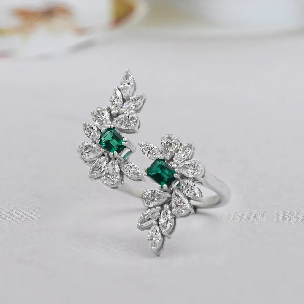 emerald diamond bypass ring 