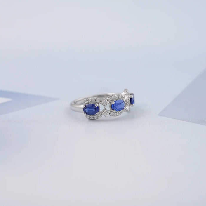 Oval Sapphire Halo Three Stone Engagement Ring