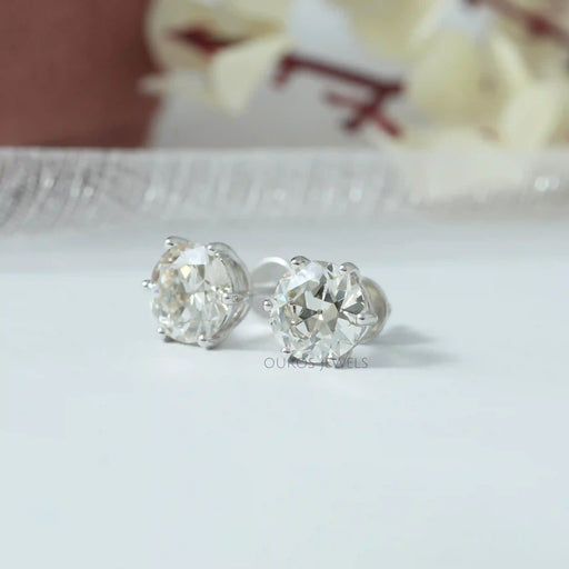side view six prong setting old european cut diamond stud earrings white gold