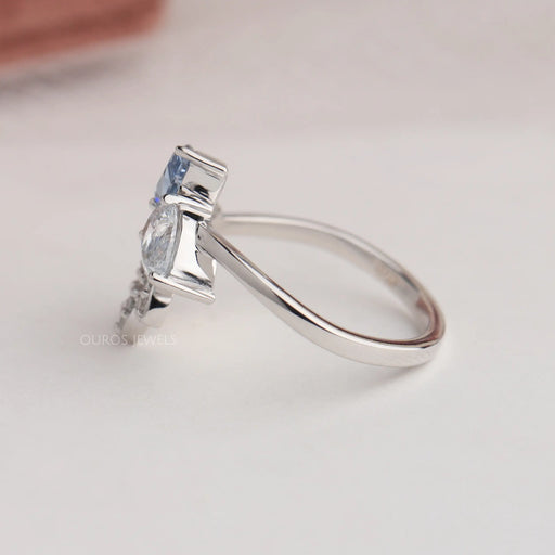 14k white gold curved shank of flower shaped lab made diamond engagement ring