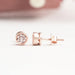 front back view of bezel set pink round cut diamond screw back stud earrings
