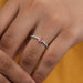 pink kite-cut lab-grown diamond solitaire accent wedding ring in finger