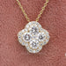 front view of flower shape halo round diamond cluster pendant yellow gold